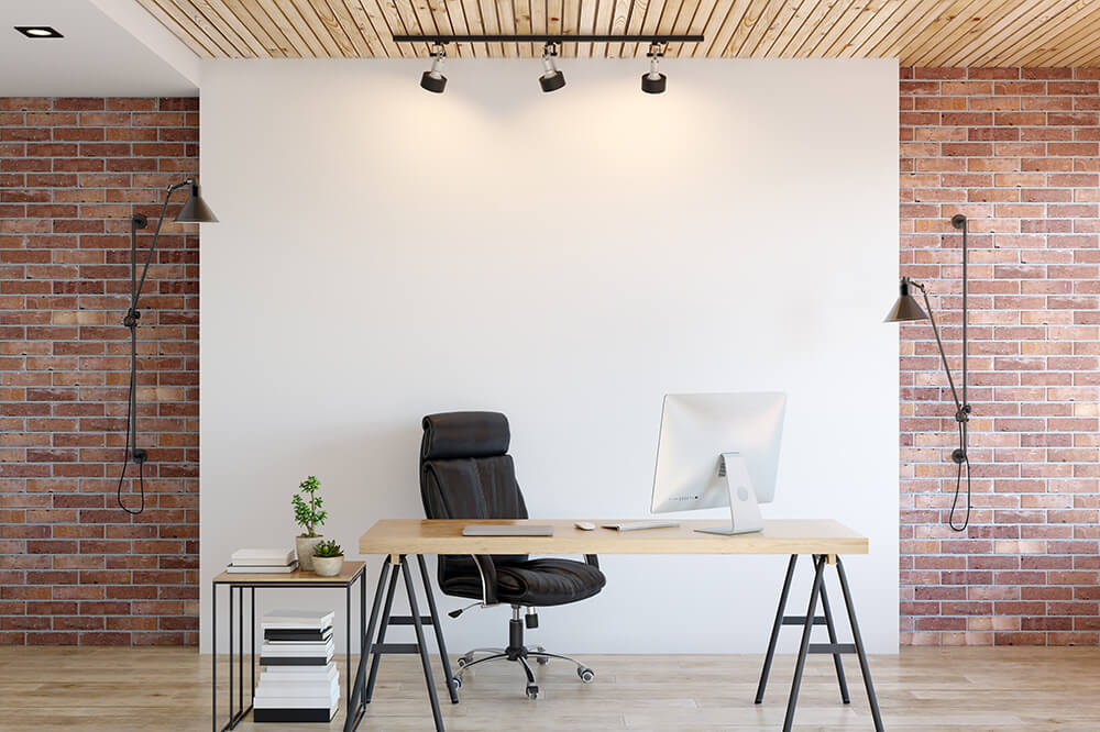 home office with good lighting setup and lots of lights and clear desk comfortable chair plants no clutter